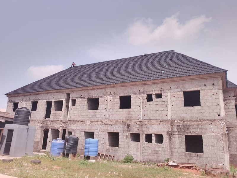 Two-storey blockwork building with the roof on